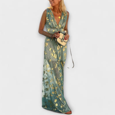 Vestit fluid amb escot en V i detalls de lluentons