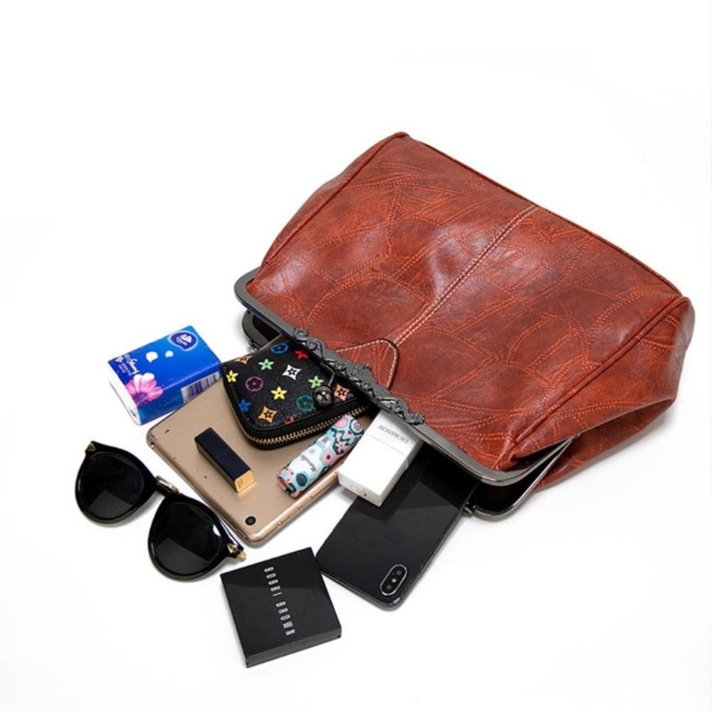 Mila - Bossa vintage atemporal amb elegant tancament de solapa