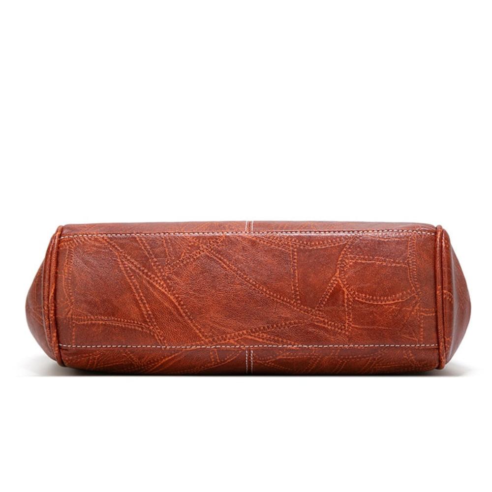 Mila - Bossa vintage atemporal amb elegant tancament de solapa