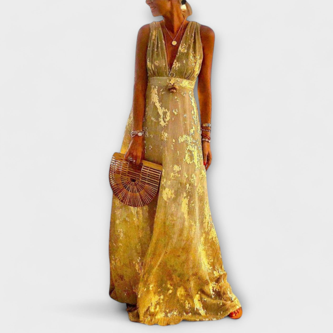 Vestit fluid amb escot en V i detalls de lluentons