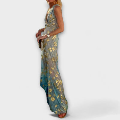 Vestit fluid amb escot en V i detalls de lluentons