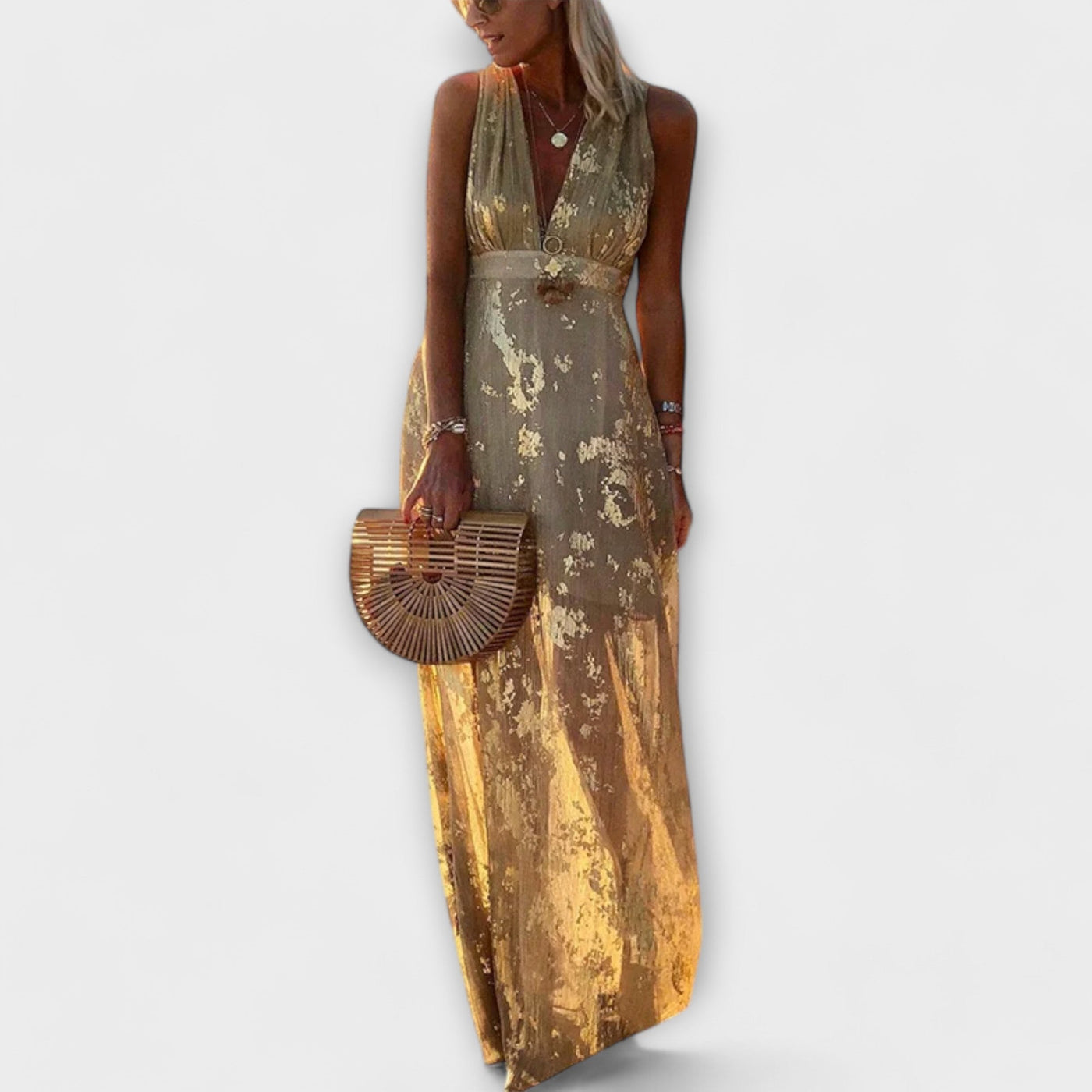 Vestit fluid amb escot en V i detalls de lluentons