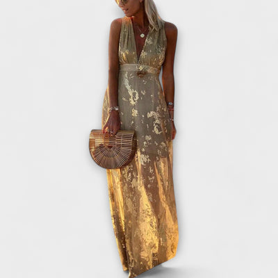 Vestit fluid amb escot en V i detalls de lluentons