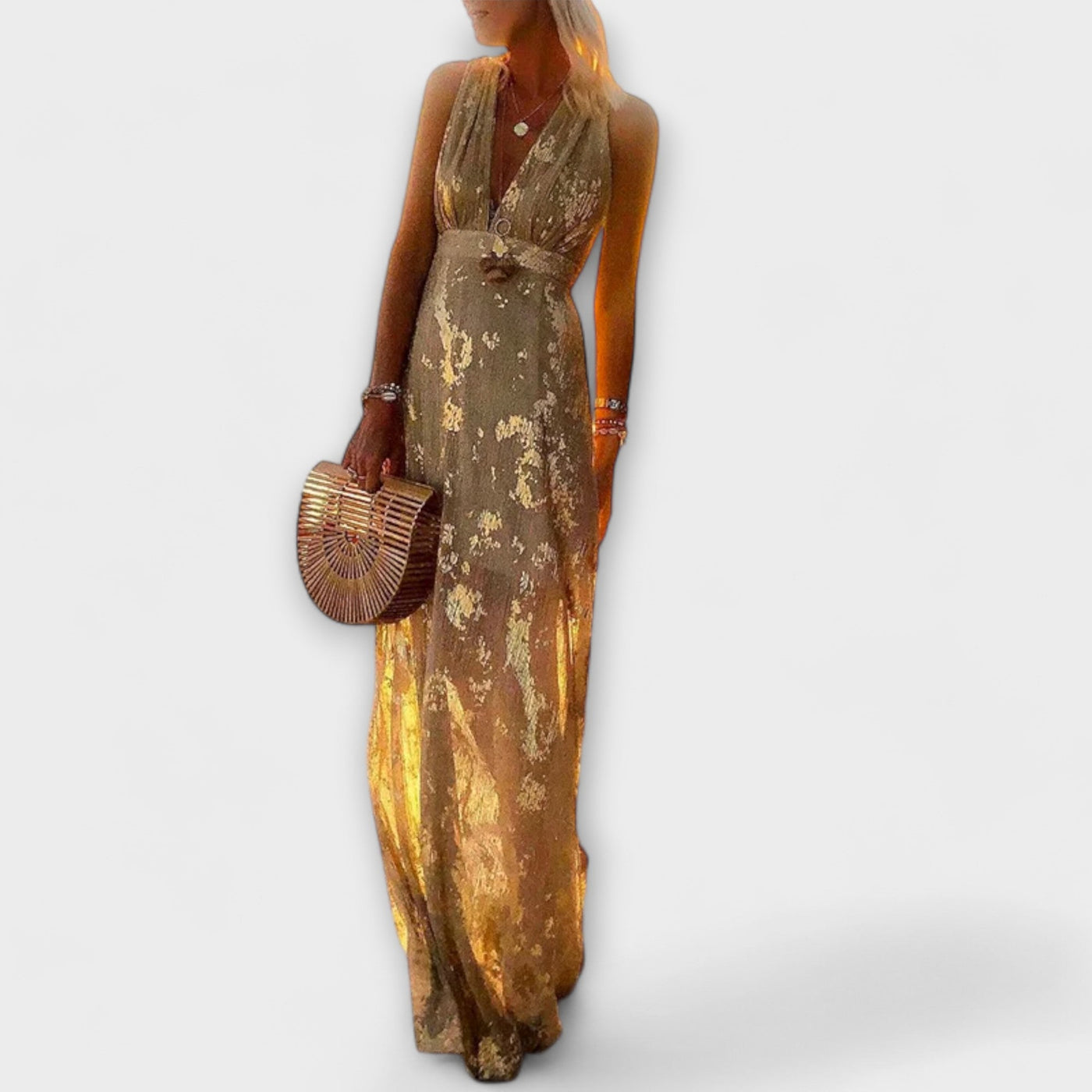 Vestit fluid amb escot en V i detalls de lluentons