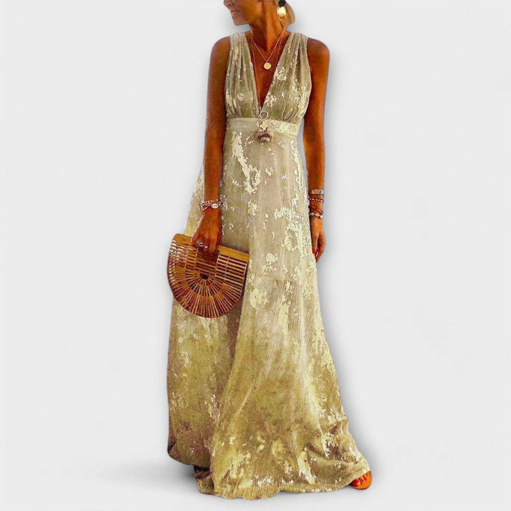 Vestit fluid amb escot en V i detalls de lluentons