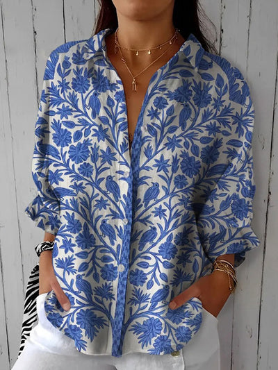 Frederica - Blusa en un jardí blau