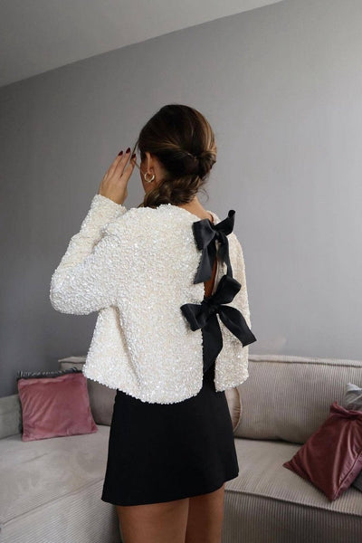 Noria™ | Blusa moderna i elegant amb detalls de llaç